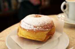 Eating a bombolone in Italy