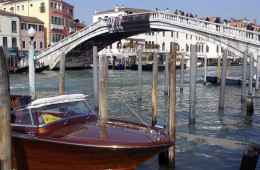 View of the Rialto Bridge with Water Taxi