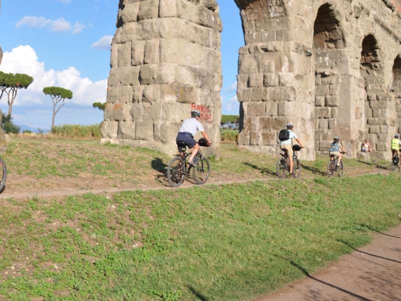 Biking through the Appian Way and Aqueducts park in Rome Biking through the Appian Way and Aqueducts park in Rome